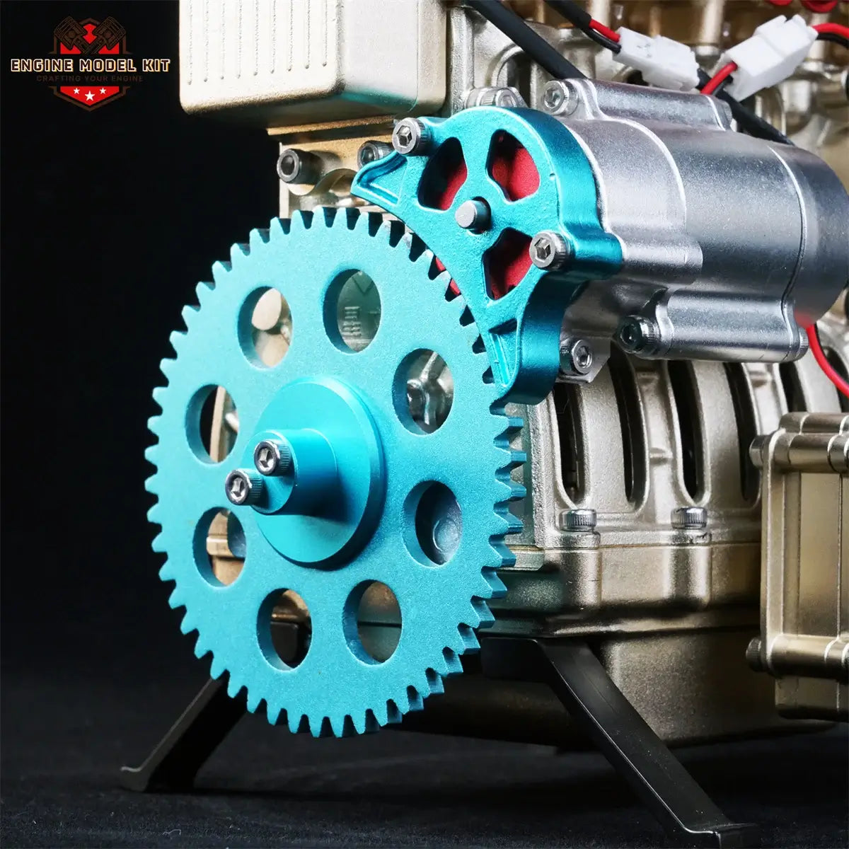 Anodized aluminum flywheel of TECHING L4 (4-cylinder) engine model for long-lasting display.