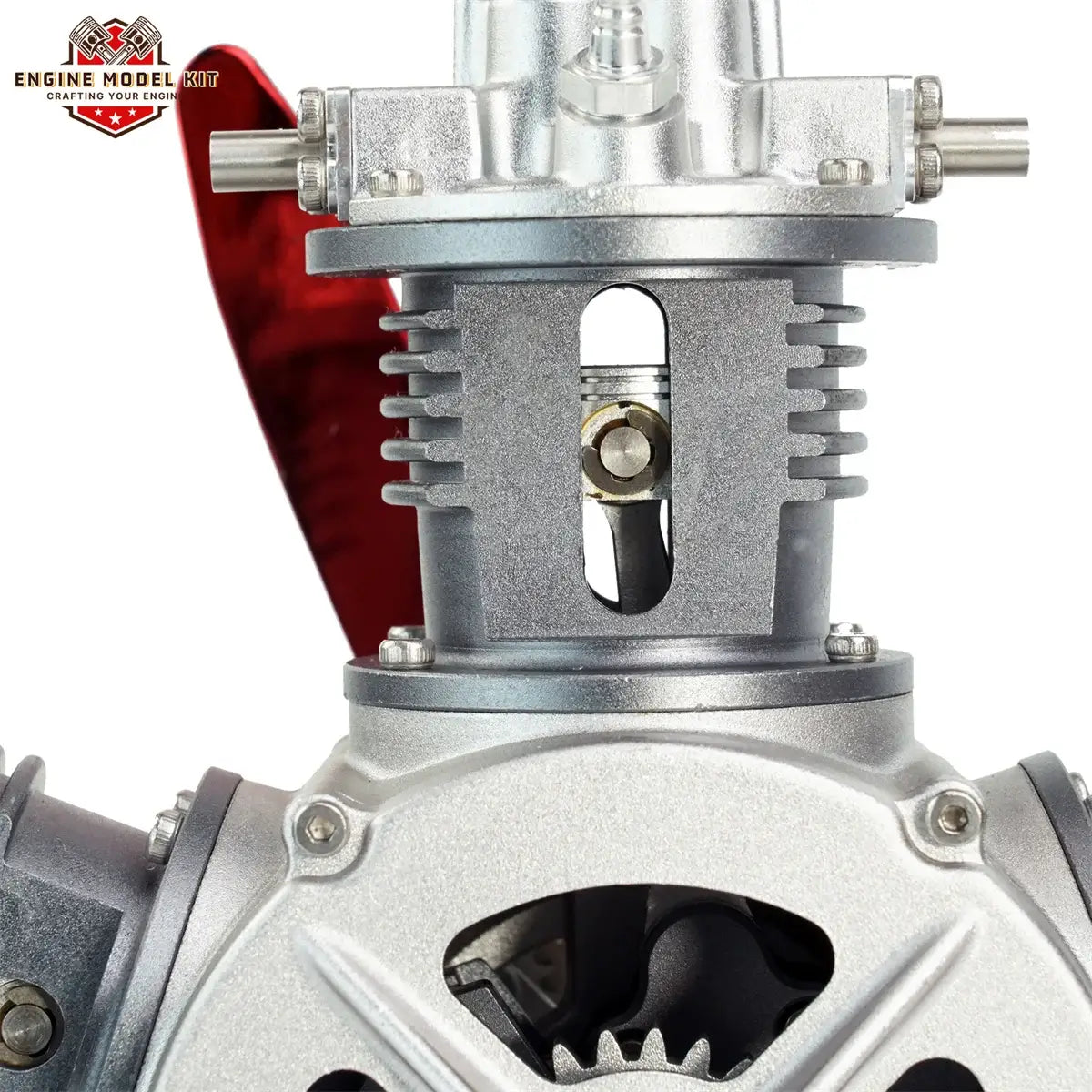 Close-up of piston detail on a 5 cylinder radial engine model kit, showing internal mechanical components in action.