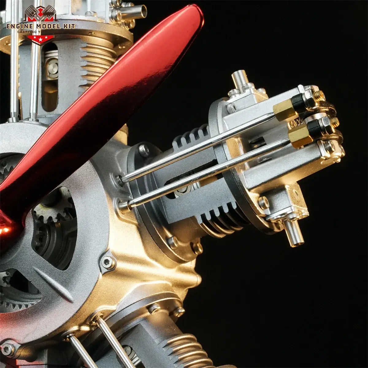 Close-up of 5-cylinder radial model airplane engine designed for desktop display and mechanical engineering education.
