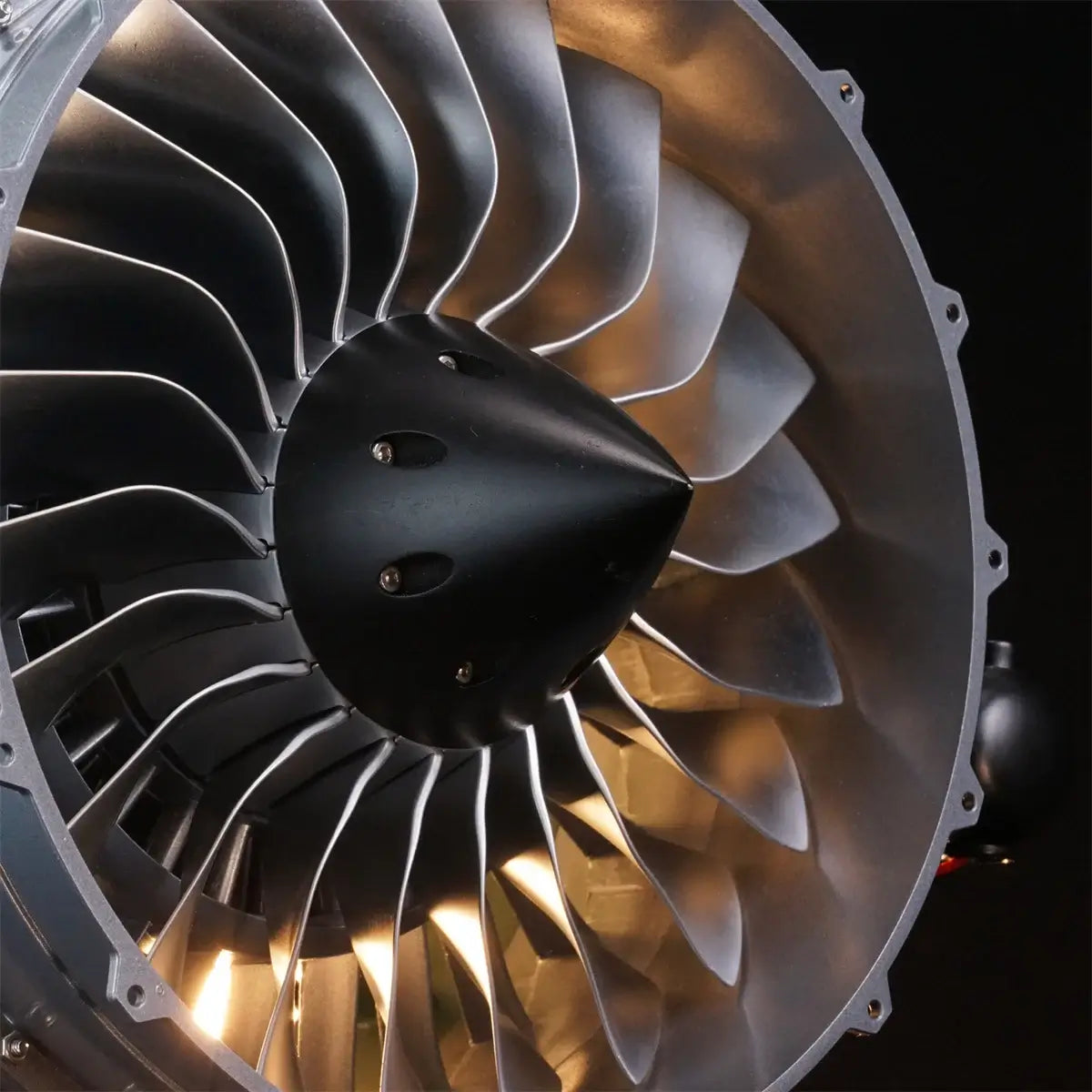 Close-up of TECHING jet engine kit that works, featuring CNC-machined aluminum fan blades.