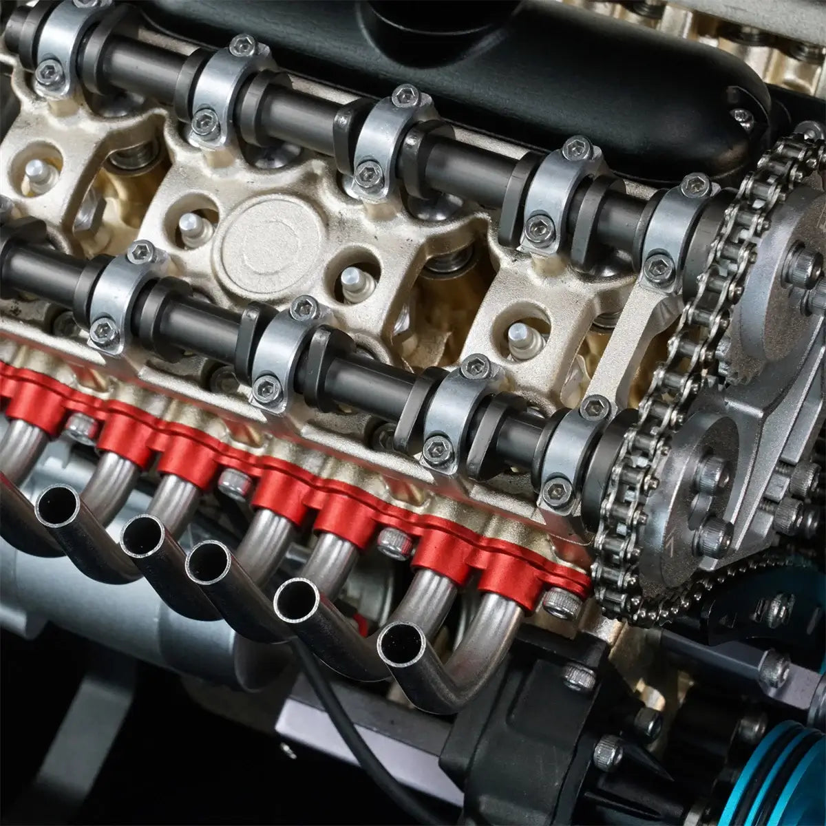 Close-up of CNC-milled camshaft on TECHING V8 model engine, showing mechanical detail.